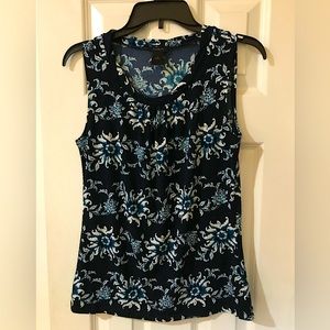 Ann Taylor sleeveless black blouse with white and turquoise flowers in size S
